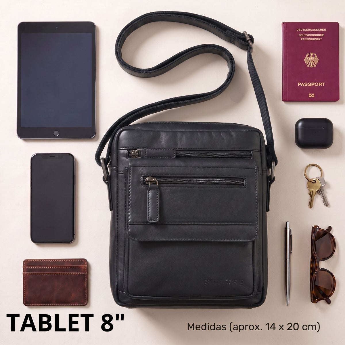Bandolera plana de cuero negro, bolsillos frontales con cremallera y correa ajustable, con tablet de 8 pulgadas y accesorios