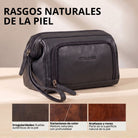 Neceser de piel negro con cremallera, asa de muñeca y la marca STILORD en relieve, perspectiva lateral